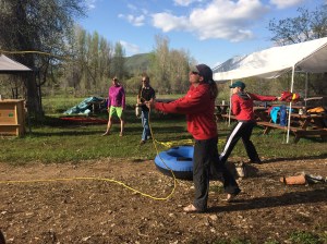 River guides practicing throw ropes for rescue